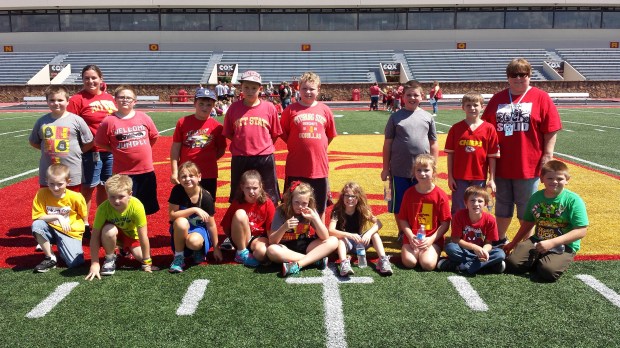 Mrs Denham's 3rd Grade Class takes a Class Photo at Friday's Paint The Town Red celebration at Pittsburg State.