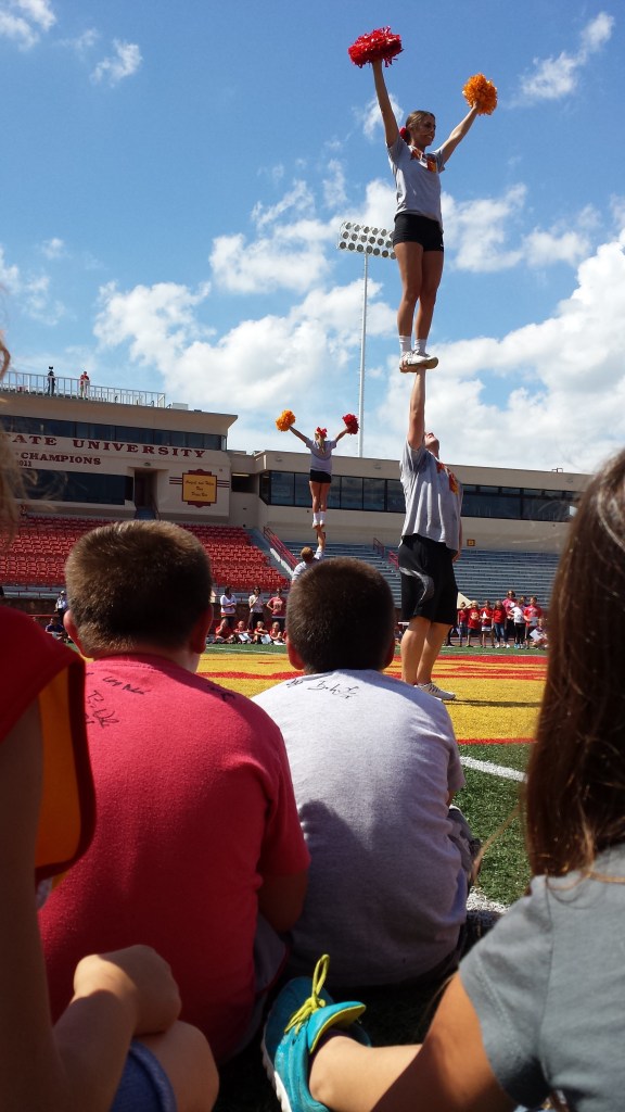 Mrs Denham and Mrs Fox's 3rd Grade Classes watch the Spirit Squad perform at Friday's Paint The Town Red celebration at Pittsburg State.
