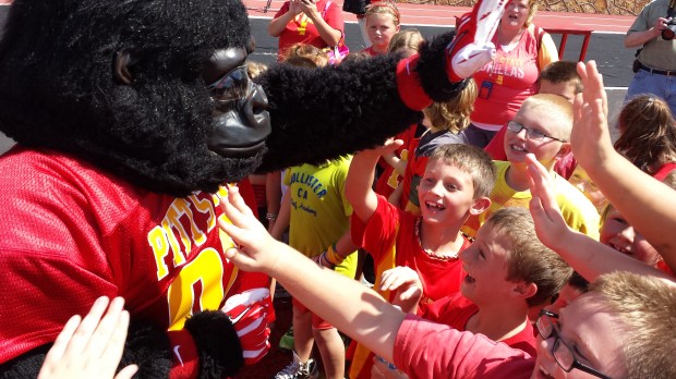 Mrs Denham and Mrs Fox's 3rd Grade classes with Gus The Gorilla at Friday's Paint The Town Red celebration at Pittsburg State.