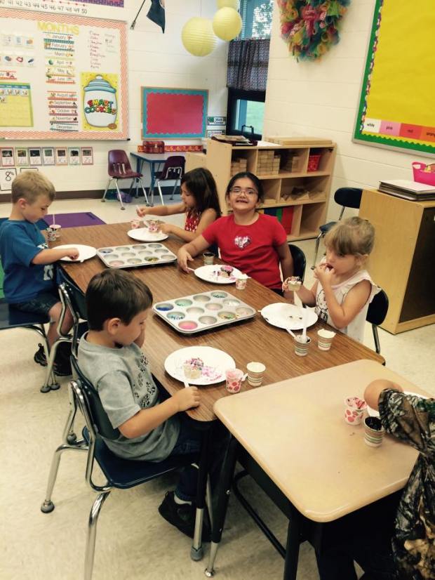 It's the last week of the summer program for the elementary students and on Wednesday they celebrated by decorating cupcakes.  Photo courtesy of Cara Kubler.